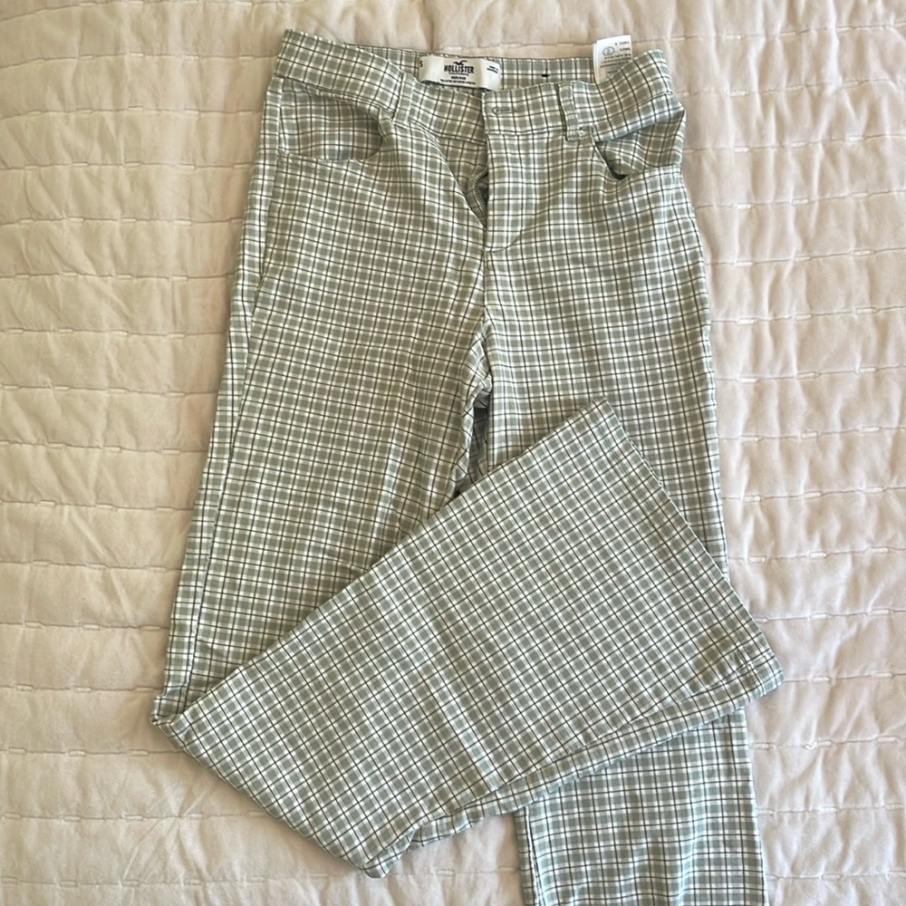 Size small Hollister pants. Green and white checkered, flare bottoms.